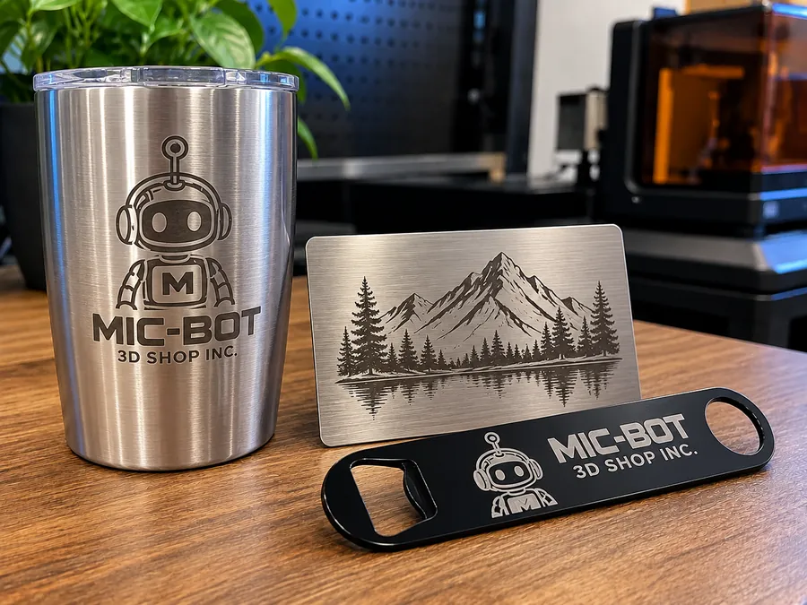 Laser-engraved stainless tumbler, metal business card and black coated bottle opener